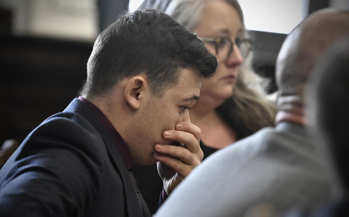 Kyle Rittenhouse puts his hand over his face as he is found not guilty on all counts at the Kenosha County Courthouse on Nov. 19, 2021, in Kenosha, Wisconsin.