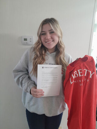 Mother inspired by her late daughter’s dream to attend Liberty earns same degree in her honor