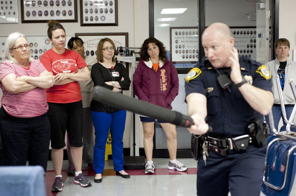 Lynchburg teachers learn what it takes to be a police officer Local