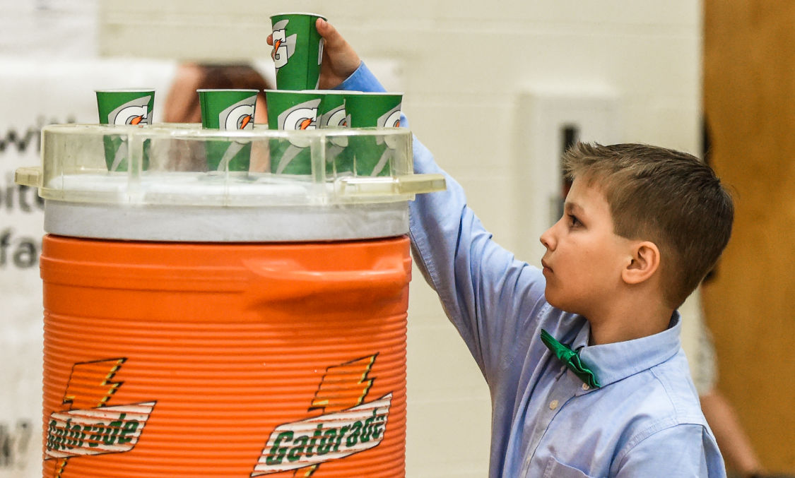Coach's son makes a splash as waterboy Sports