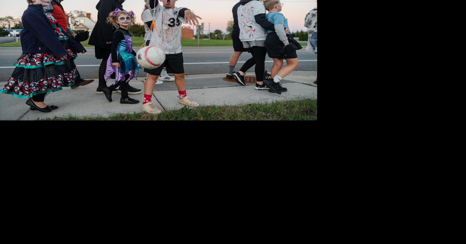Zombies walk through Amherst for charity