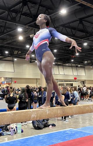 Lady Flames gymnasts claim first national championship