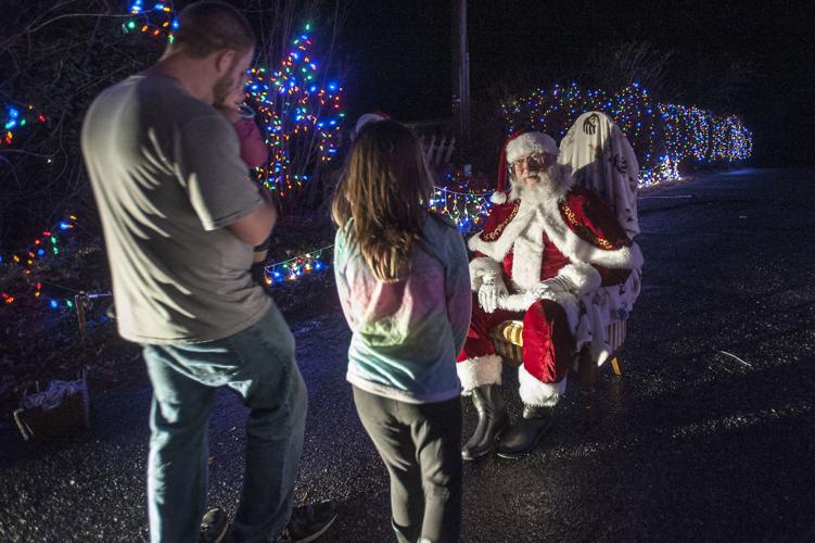 Leesville Road house lights up night with Christmas cheer