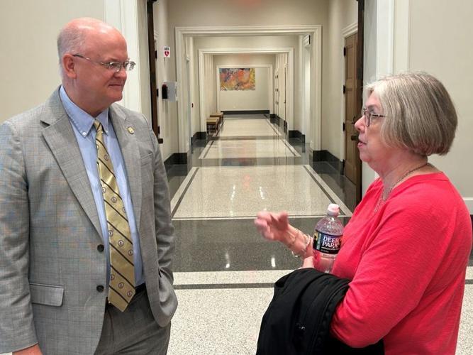 Del. Otto Wachsmann Jr., R-Sussex County, chats with Martha Bryant, the mother of a Hiram W. Davis Medical Center patient, after the Joint Commission on Health Care meeting Thursday, May 7, 2026. Wachsmann is a member of the commission.