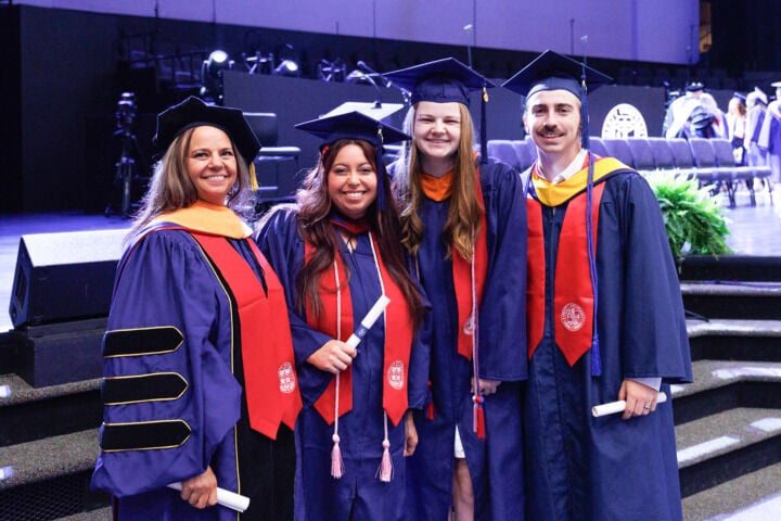 Family Ties: Parents, children, siblings celebrate together as fellow members of the Class of 2026