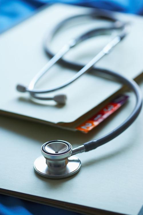 Stethoscope, medical charts