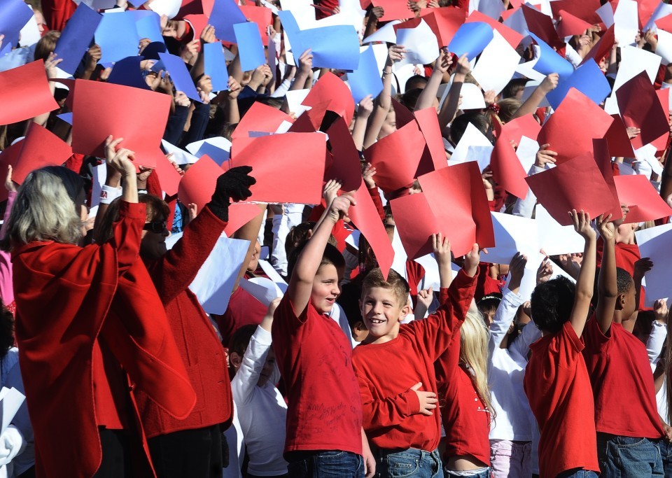 Twin Springs Elementary students form huge American flag in tribute to