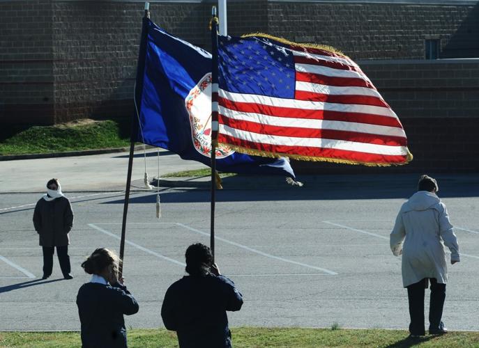 Twin Springs Elementary students form huge American flag in tribute to