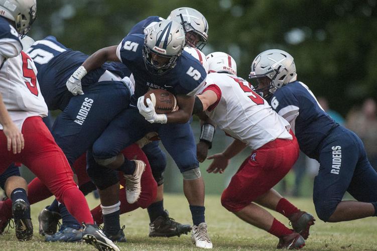 Life in Appomattox Football players serve as role models, symbols of hope