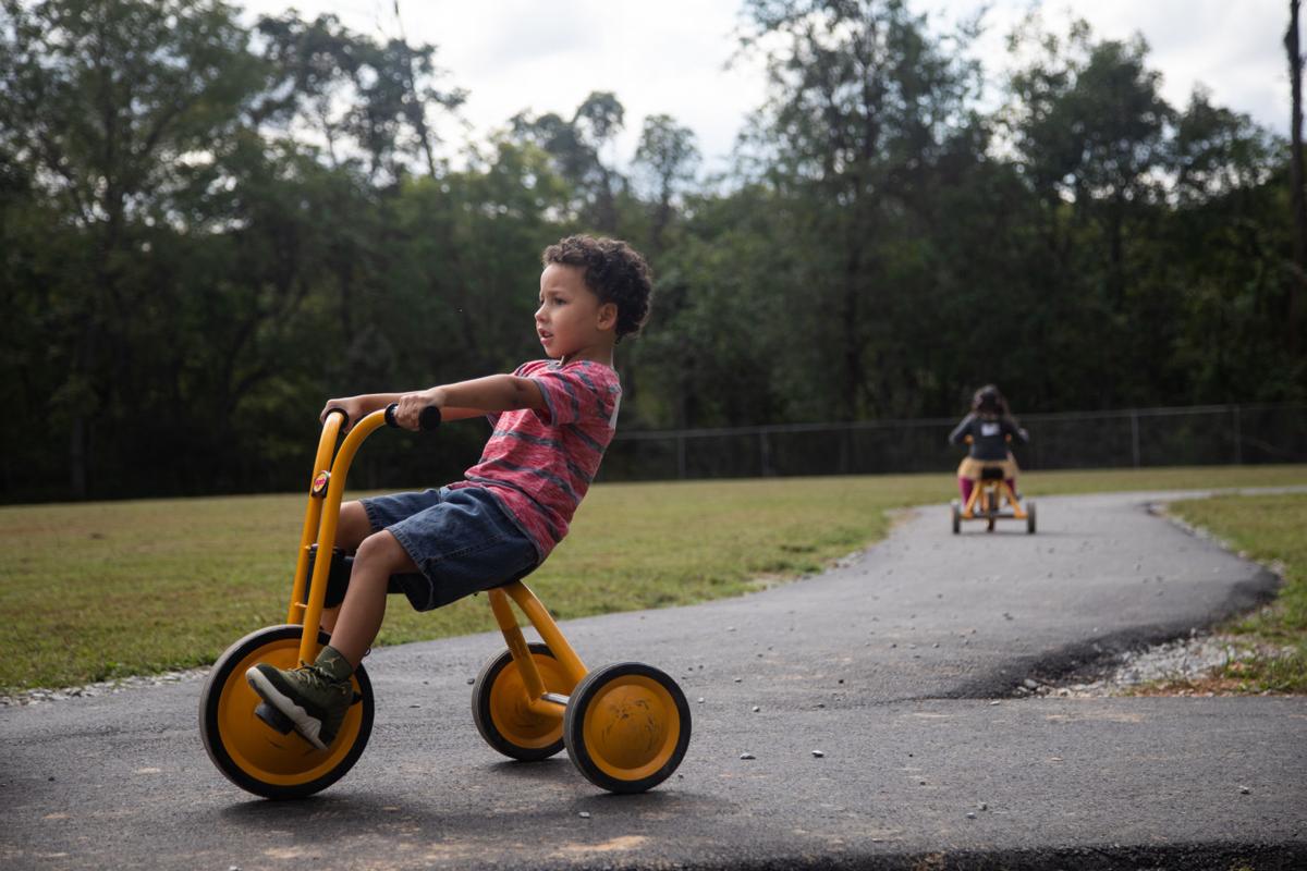 Along for the ride Students rev up for new bike path at