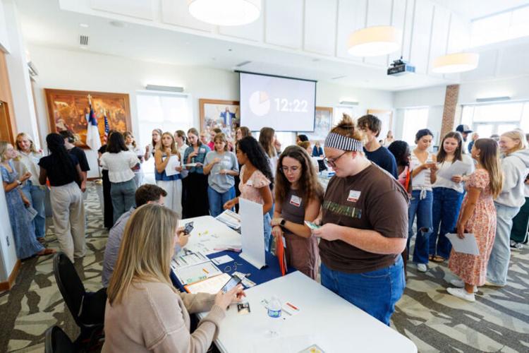 FACS students learn about challenges facing poverty-stricken families during simulation event