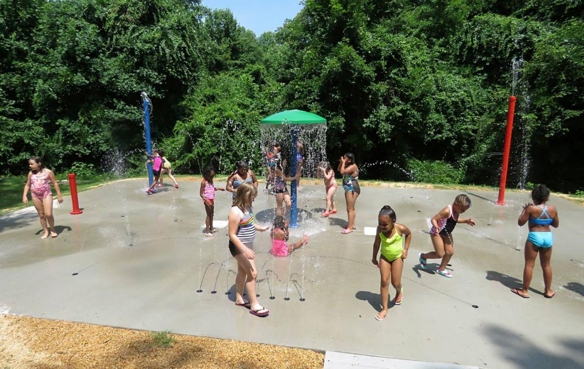 Girls at Camp Sacajawea celebrate new splash pad Local News