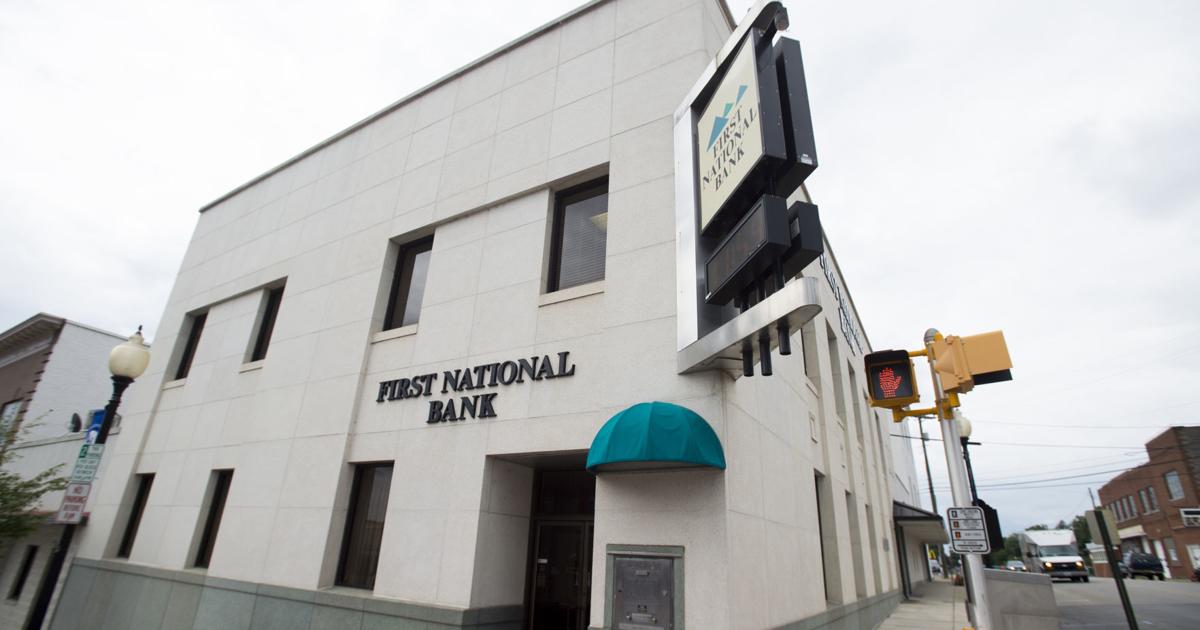 First National Bank's parent reports higher 3Q profit