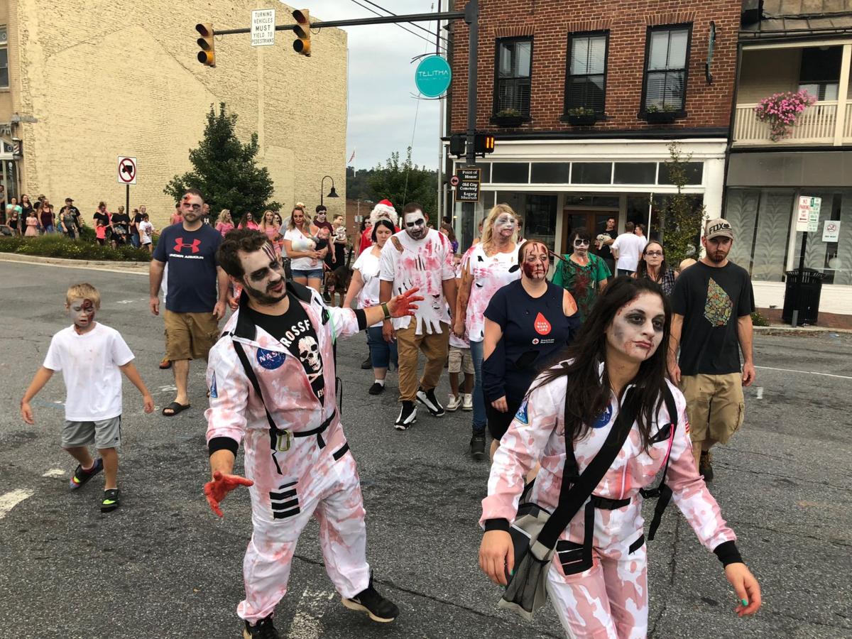 Undead horde crowds Main Street as part of annual Lynchburg Zombie Walk