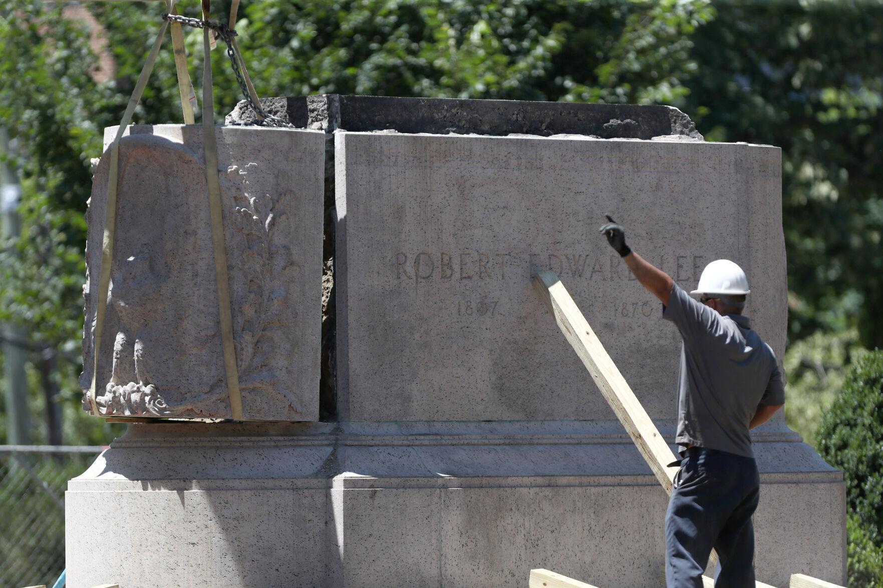 WATCH NOW Charlottesville begins removing bases of Lee, Jackson