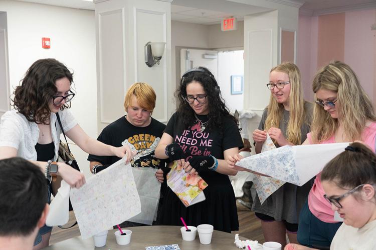 Student club forms bonds with area seniors through crafts, music, fellowship