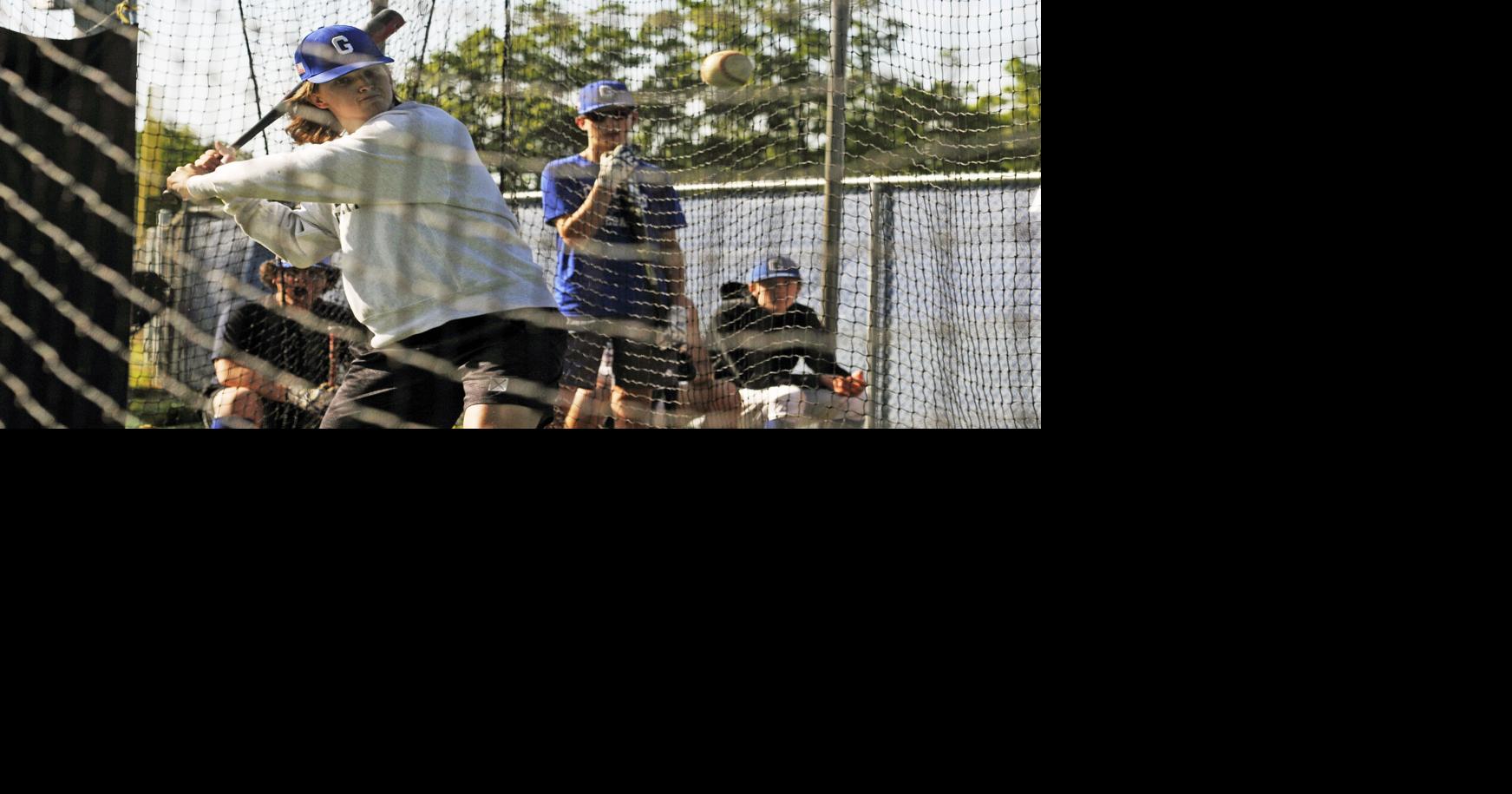 E.C. Glass' George Best, a baseball standout, takes a swing at ...