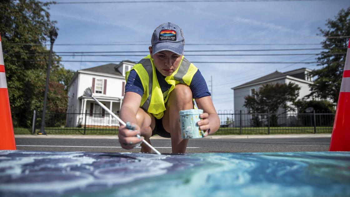 Artist paints Lynchburg storm drains as reminder: Think twice about what goes into waterways - Lynchburg News and Advance