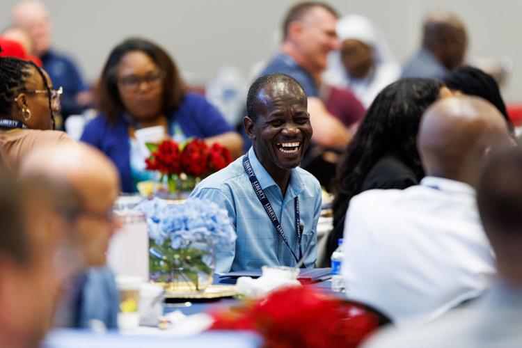 Weeklong event opens door for online doctoral students to explore campus, receive in-person instruction