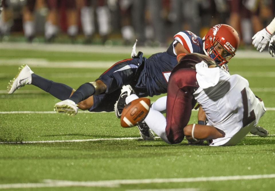 Liberty University defender Justin Guillory breaks up a pass intended for the University of Montana's Ellis Henderson during Saturday's contest at Williams Stadium. (Lee Luther, Jr./Lynchburg News and Advance)