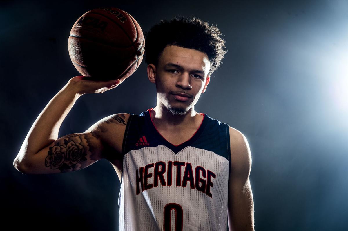 all area boys basketball player of the year cj rosser heritage