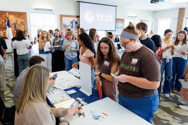 FACS students learn about challenges facing poverty-stricken families during simulation event
