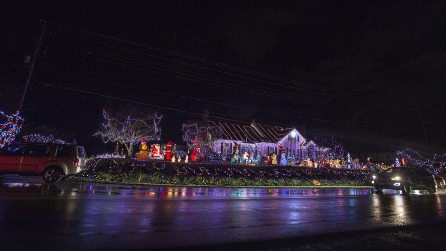 Leesville Road house lights up night with Christmas cheer