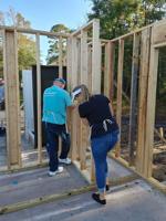 Brunswick County realtors frame Habitat for Humanity home