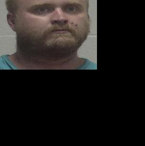 2 charged in E-Z Choice robbery