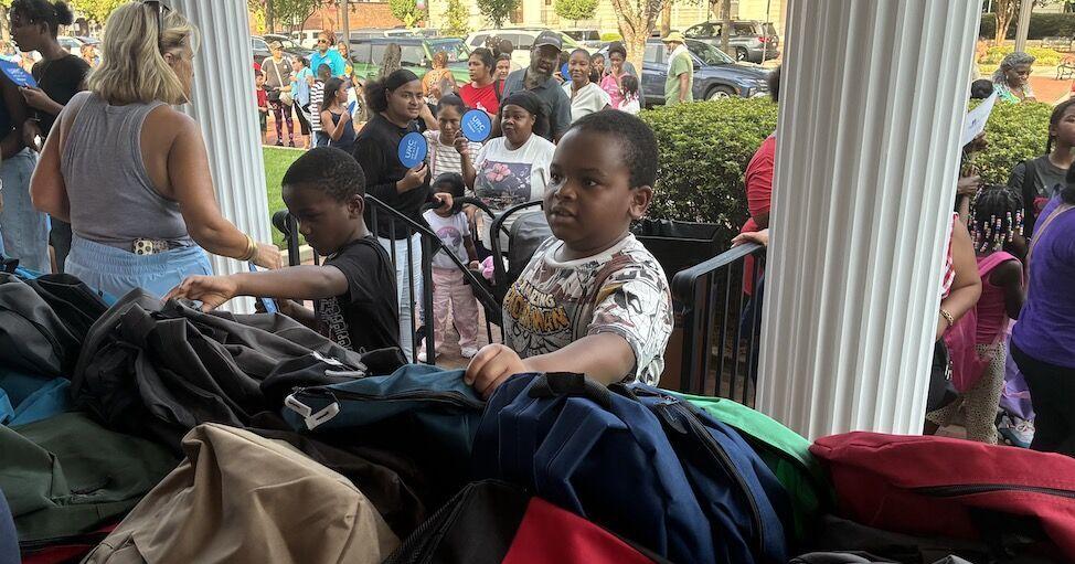 Hundreds receive backpacks, school supplies