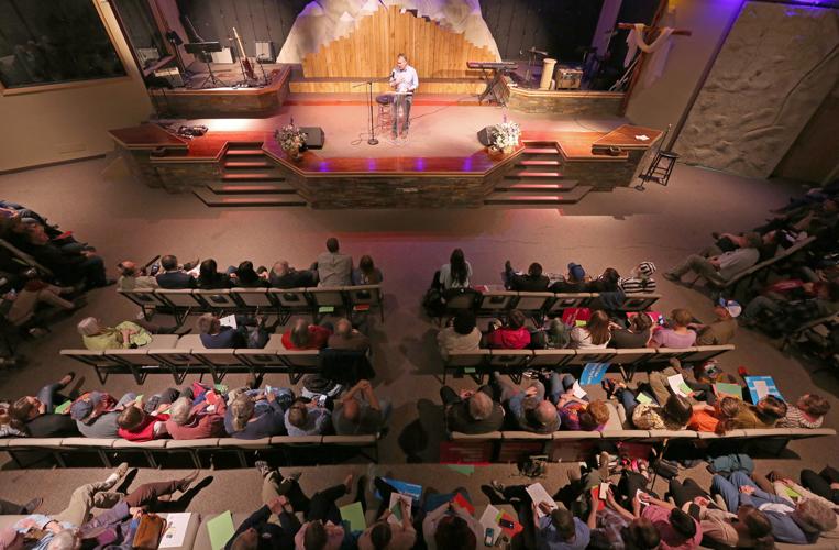 Sen. Dan Sullivan sees reds and greens from public at town hall Local