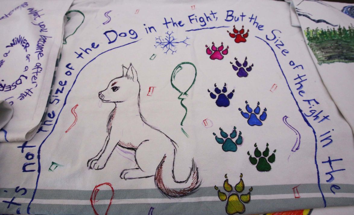 Denali Center Donates Doggy Blankets to the Yukon Quest