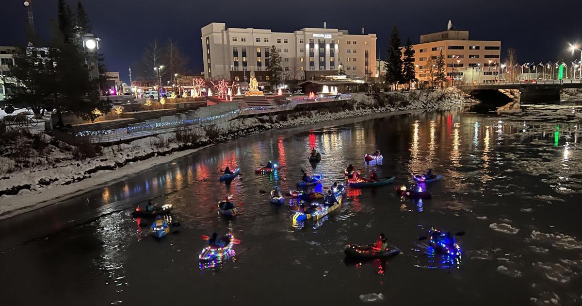 Paddlers celebrate change of season with glow float | Kris Capps ...
