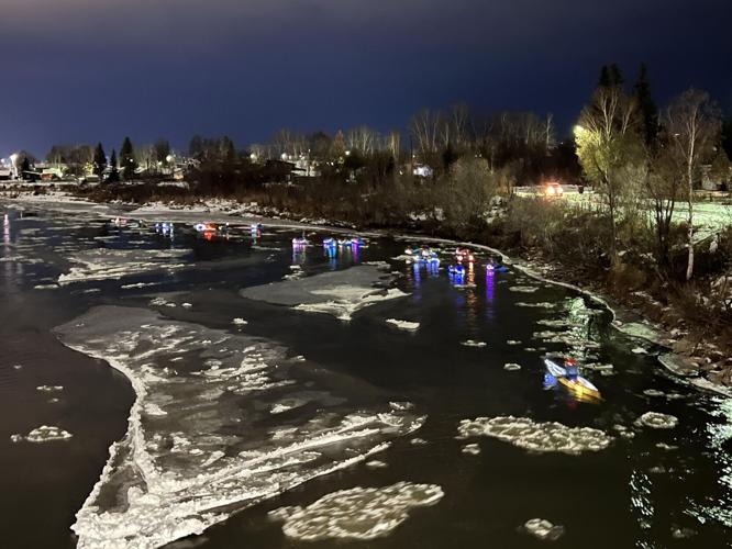 Paddlers celebrate change of season with glow float | Kris Capps ...