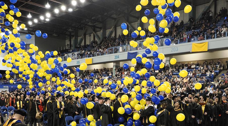 Ballons drop on graduates at 2025 UAF Commencement