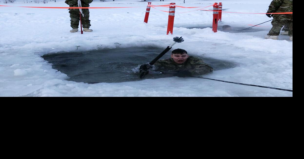 Fort Wainwright soldiers take polar plunge into frigid lake | Military ...