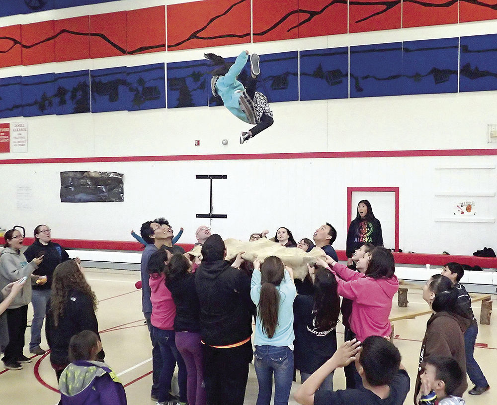 Moose skin blanket toss Traditional game the most efficient way to