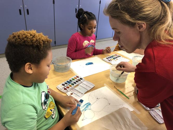 Artist in residence teaches children about color theory and painting