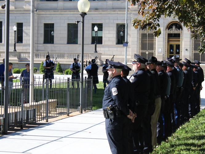 Local law enforcement agencies, community members honor fallen officers ...