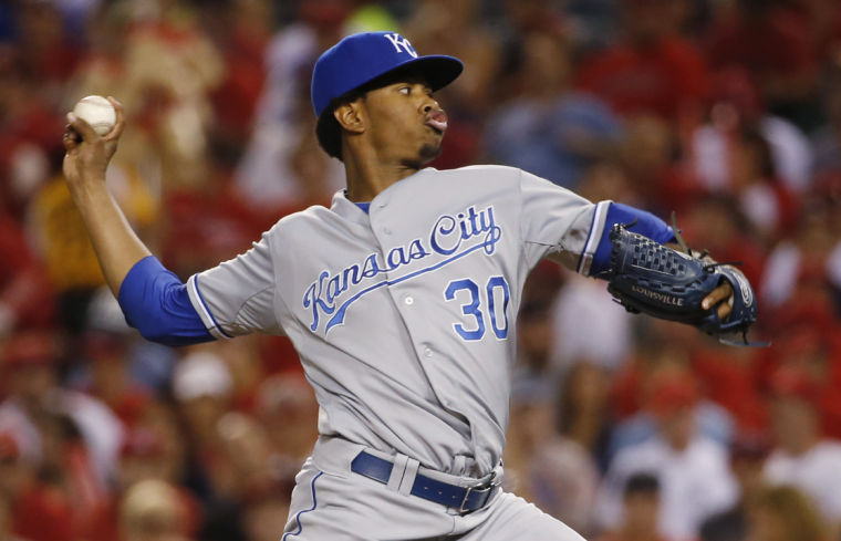 Kansas City Royals starting pitcher Yordano Ventura walks to the