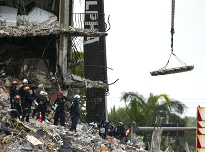 V Collapse Building Crews spend 5th day atop shaky pile of collapsed concrete ...