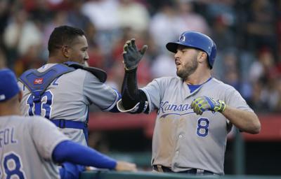 Los Angeles Angels' Mike Moustakas celebrates after hitting a