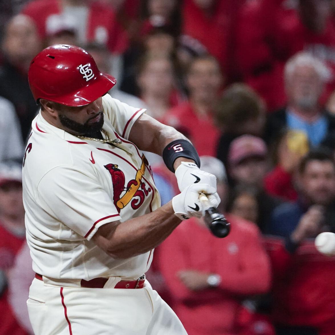 St. Louis Cardinals' Albert Pujols runs after hitting a single during the  sixth inning in Game 2 of a National League wild-card baseball playoff  series against the Philadelphia Phillies, Saturday, Oct. 8