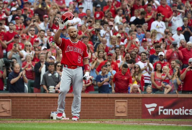 Pujols concludes return to St. Louis with 2 hits, Molina jersey