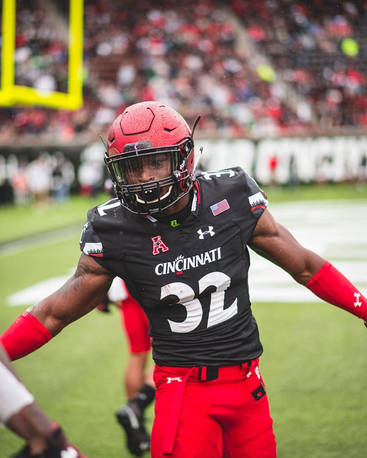Wiggins interception leads UC football win over SMU in overtime