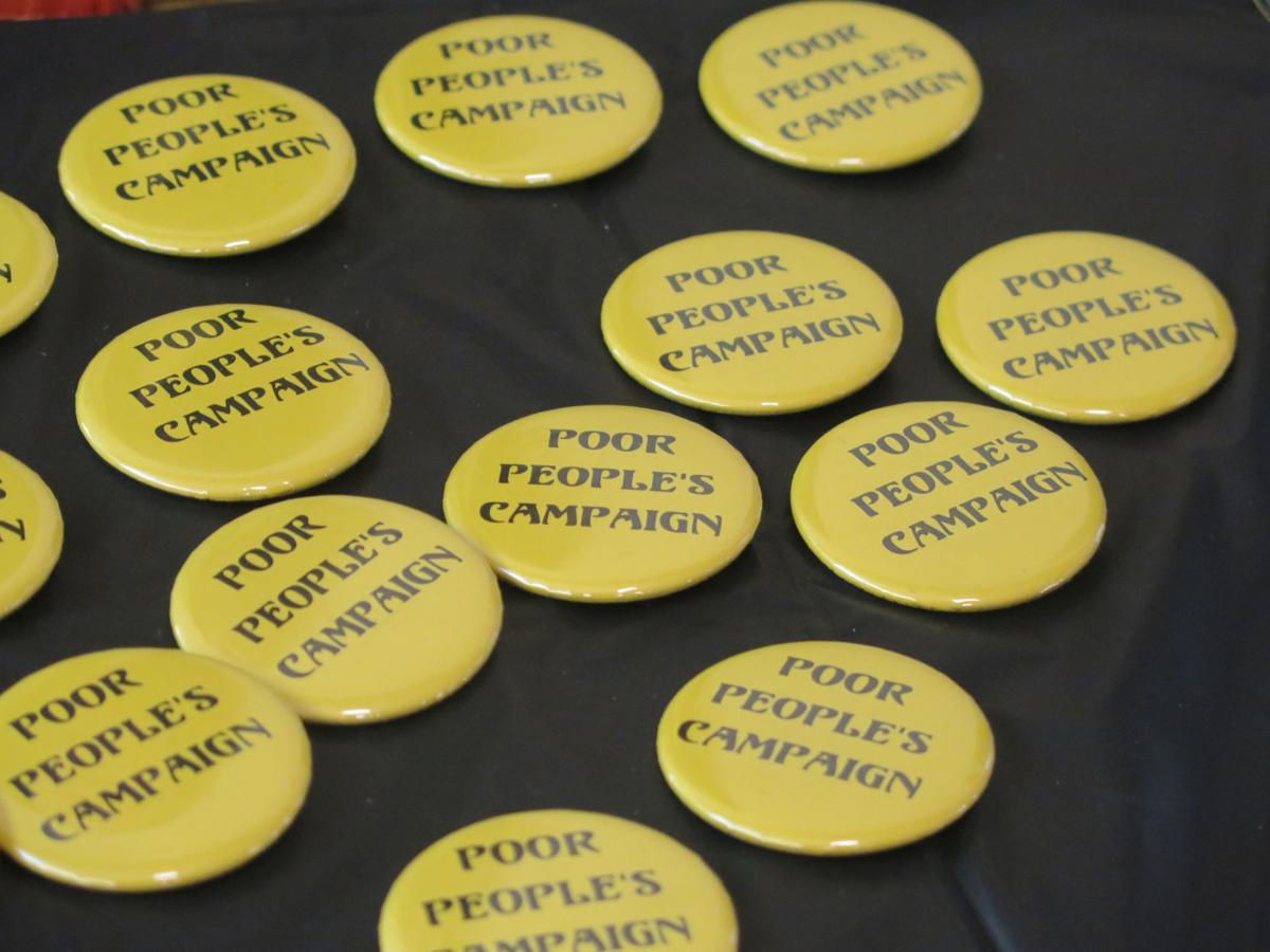 Campaign buttons were available for attendees to wear at the launch of the Shenandoah Valley chapter of the Poor People's Campaign on Friday, Jan. 24, 2020.