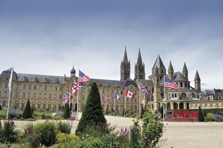 Caen town hall with US, Canada and UK flags in honor of D-Day.jpg