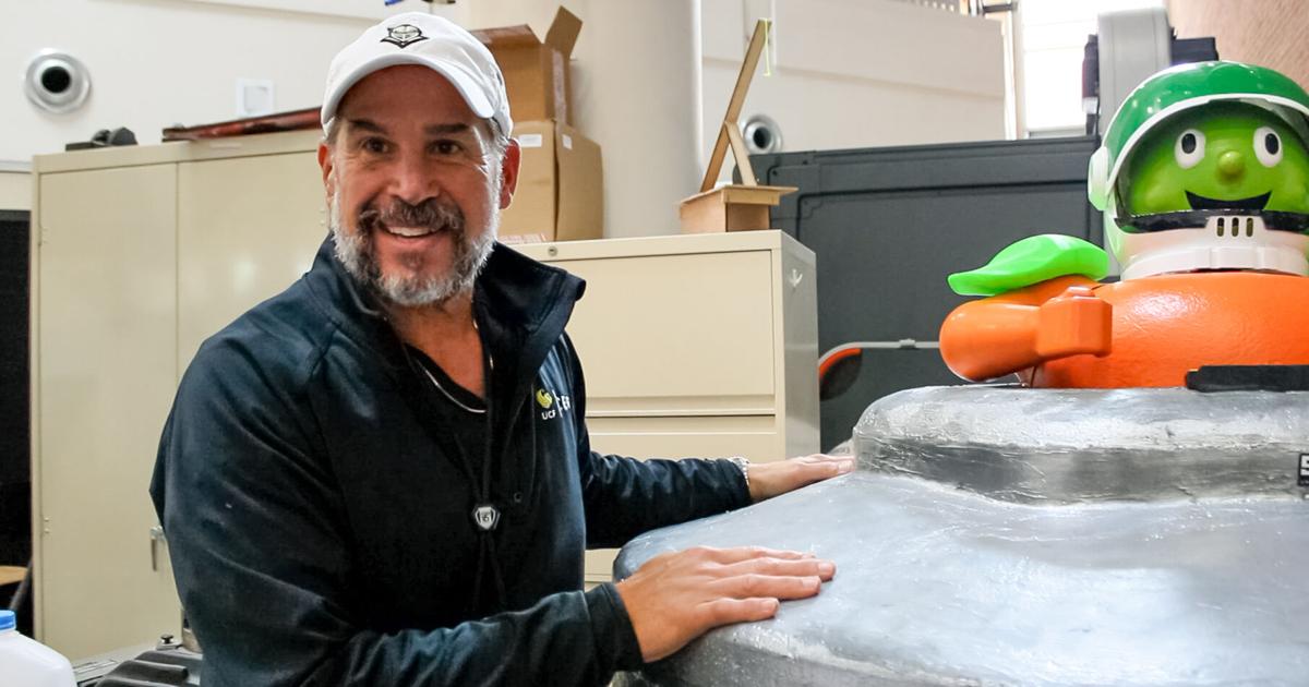 Academic Sign CECS staff member facilitates student projects full of school spirit ...