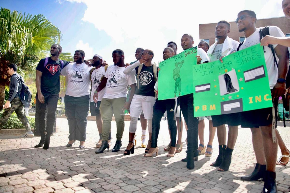 ‘A Mile In Her Shoes’: UCF organization hosts walk for domestic violence awareness month