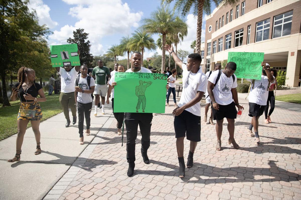 ‘A Mile In Her Shoes’: UCF organization hosts walk for domestic violence awareness month